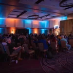 Wide audience shot from the 2024 Voices of Impact Speaker Series.