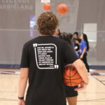 Students playing basketball at the Thornton-McFerrin Coaching Academy.